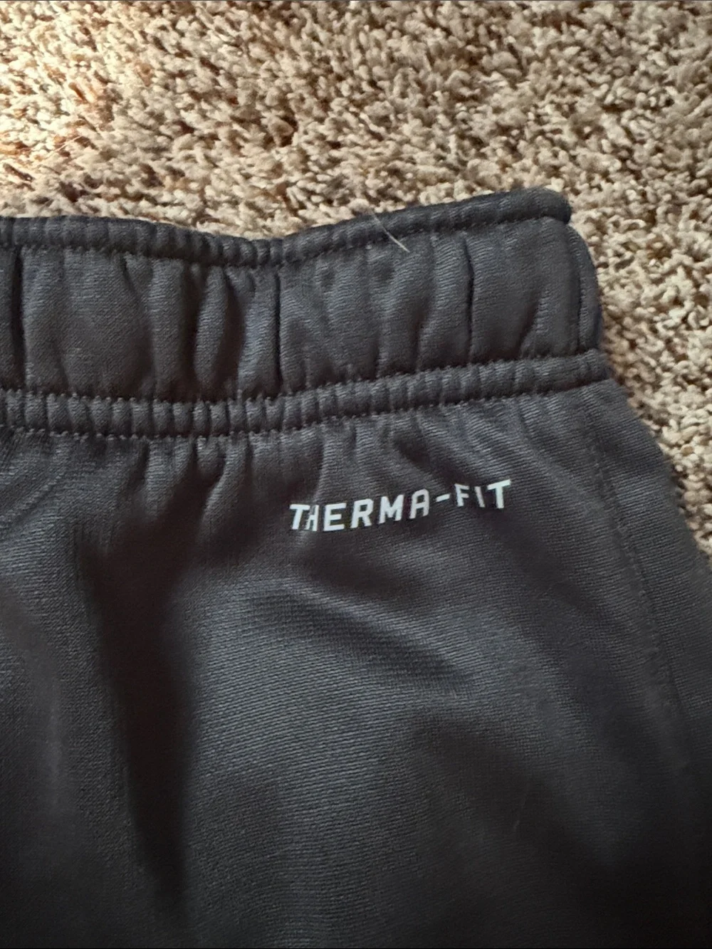 Nike dark gray Sweatpants with White Swoosh